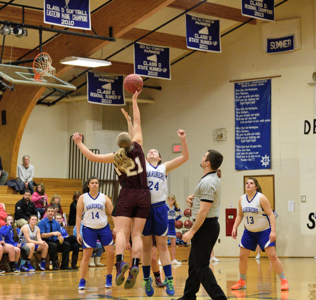 Eagle Morgan Dauk and Mariner Morgan Shepard tip off at Deer Isle.