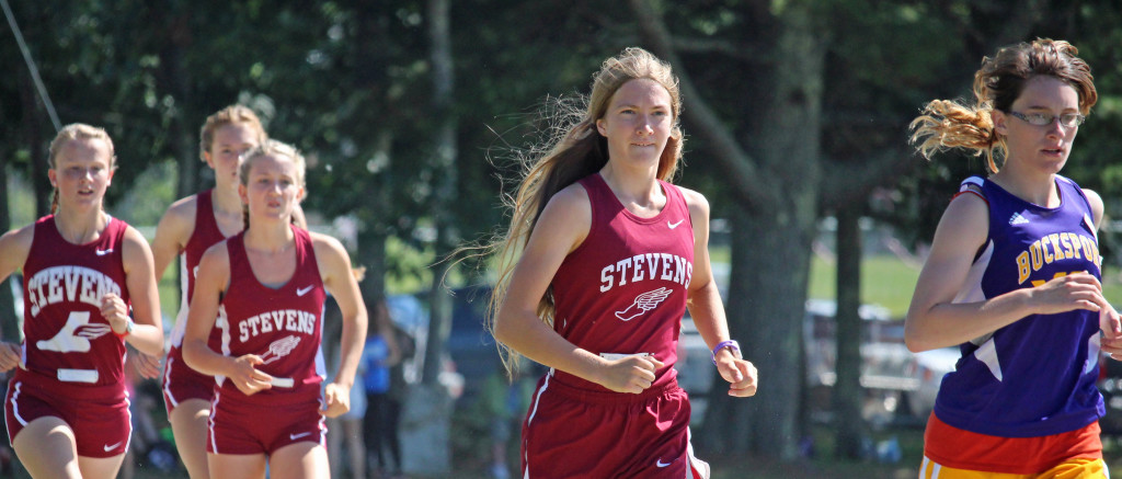 The Eagle girls race cross country at Bucksport Invitational. Photo by John RIchardson