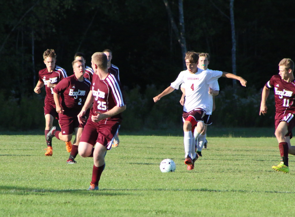 Nick Bianco works the ball against Ellsworth. Photo by Anne Berleant