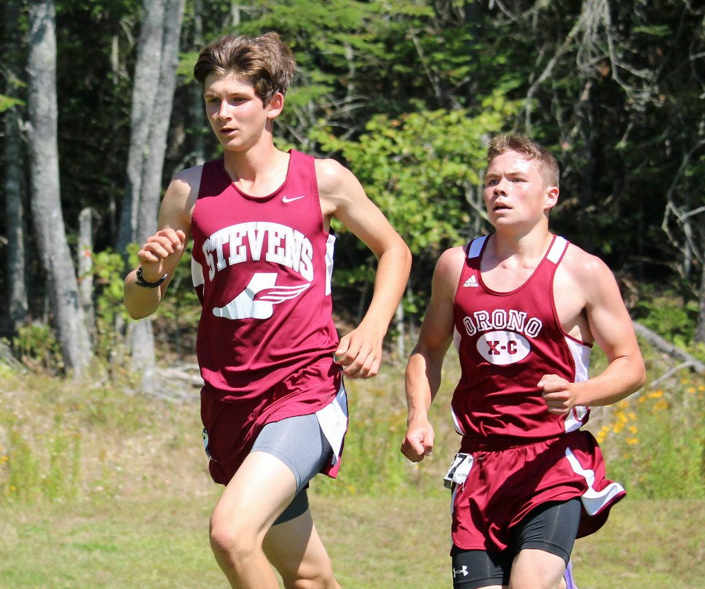 John Hassett races to a first-place finish for George Stevens Academy at the Ellsworth Invitational on September 5. Photo by John Richardson