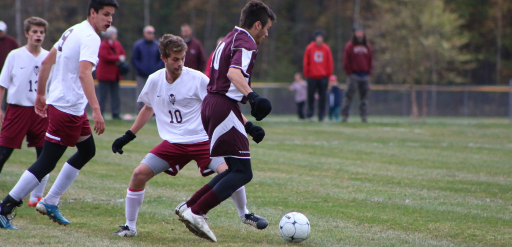 John Larson scored both Eagles goals early in the second half. Photo by Anne Berleant