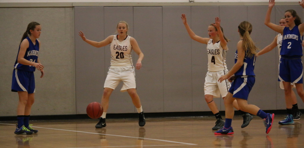 Whos got the ball? The Eagles hosted the Mariners for the season opener. Photo by Anne Berleant