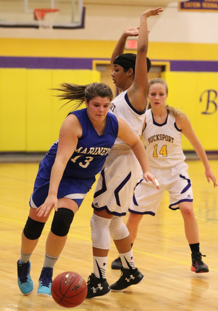 Allyson Eaton slides past Bucksport defense. Photo by Sandra Shepard
