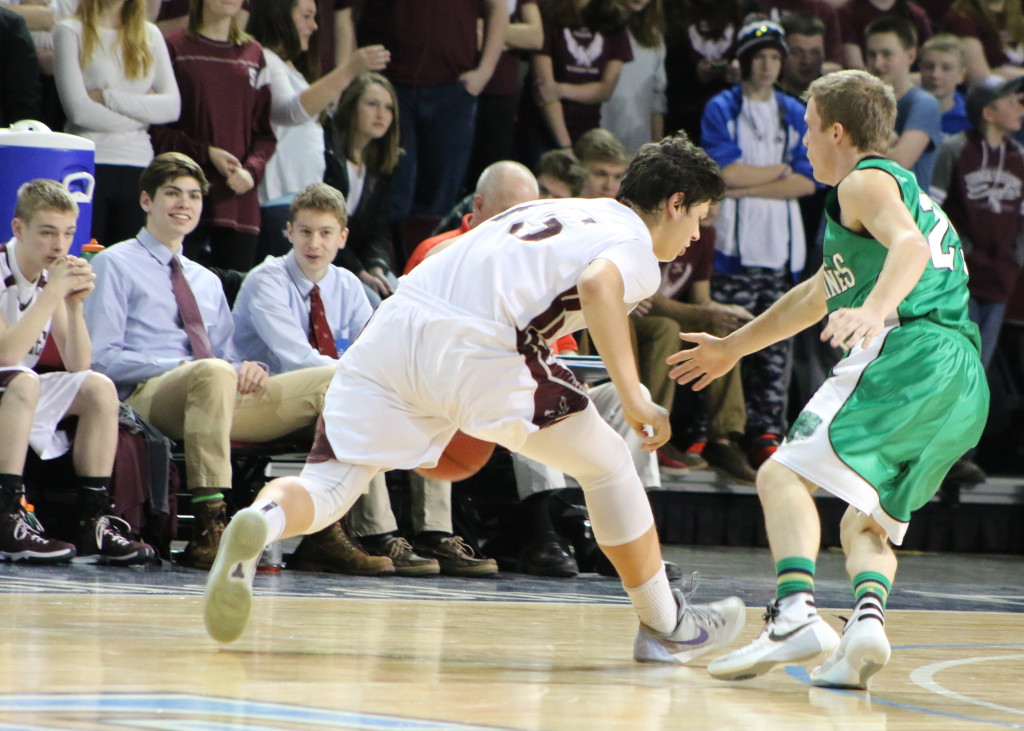 Stefan Simmons drives around the Schenck defense. Photo by Anne Berleant
