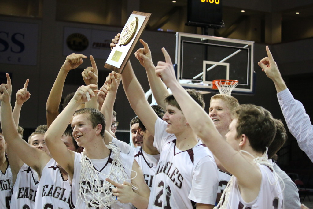 The team celebrates winning the Class C North title. Photo by Anne Berleant