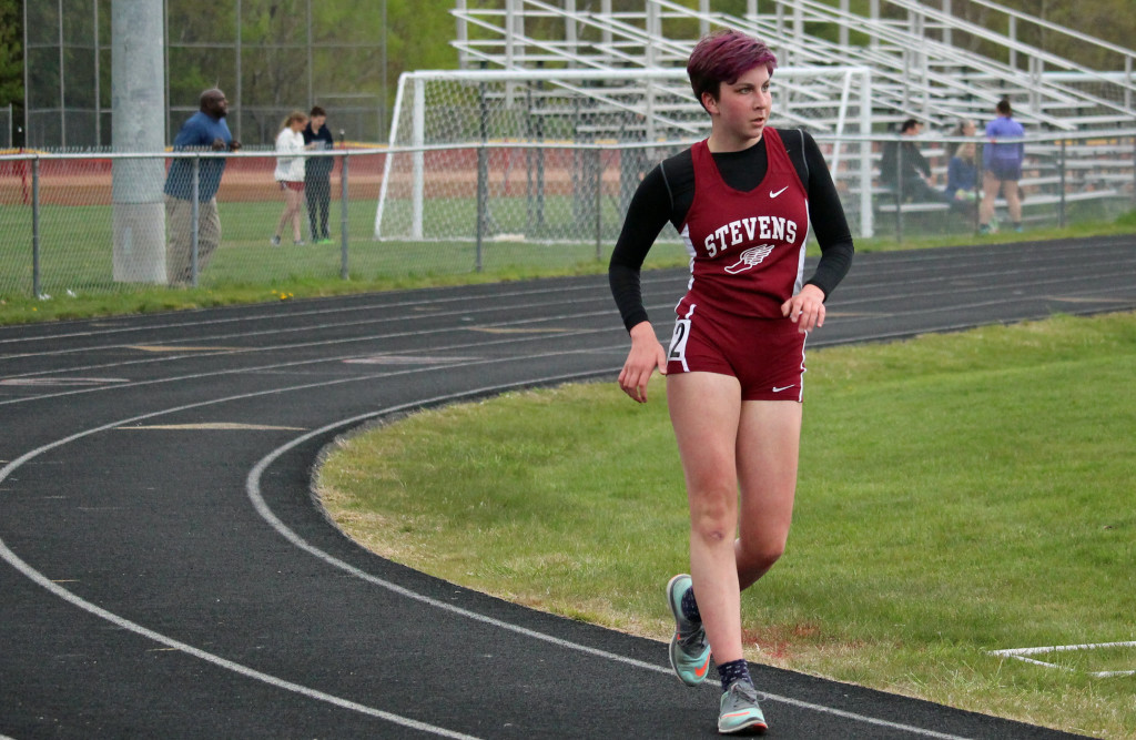 Ava Sealander places 2d in the 1600 meter race walk at Bangor. Photo by John Richardson