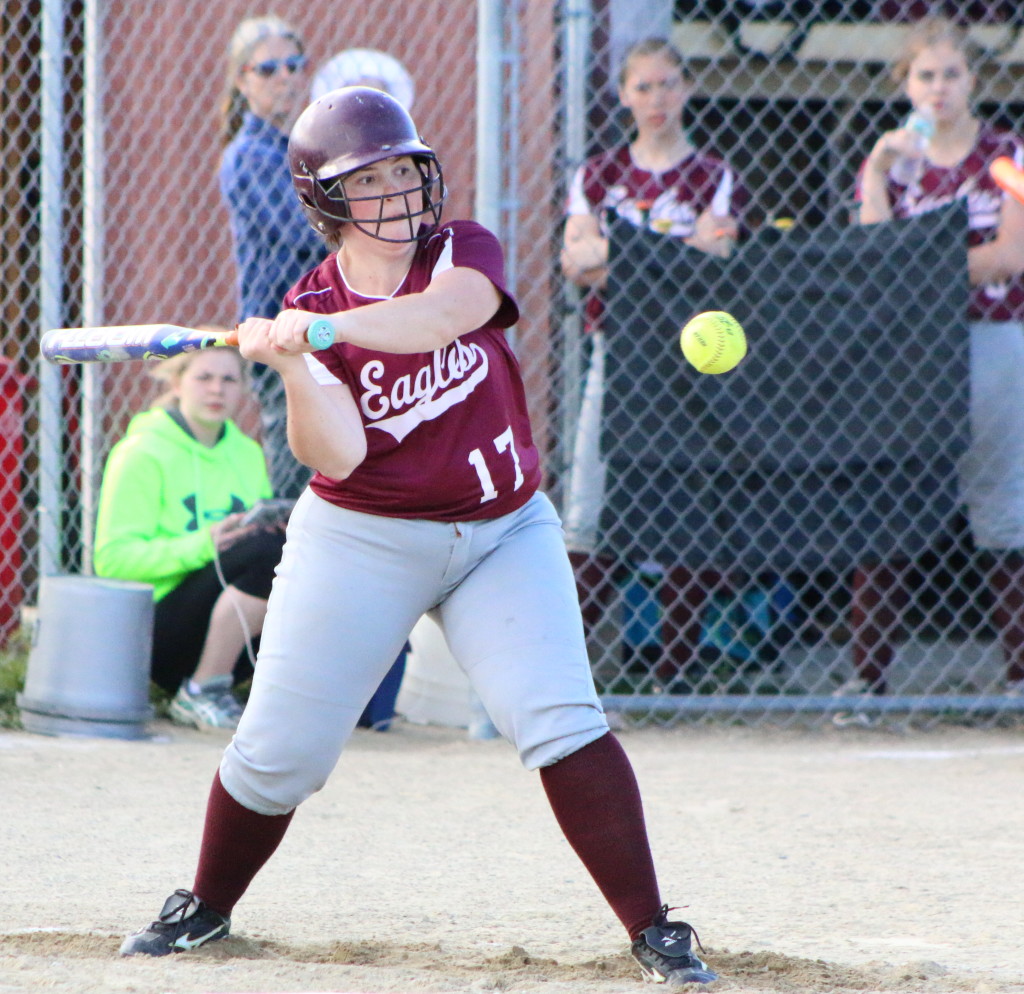 Emma Weed cracks a single down the first base line. Photo by Monique Labbe