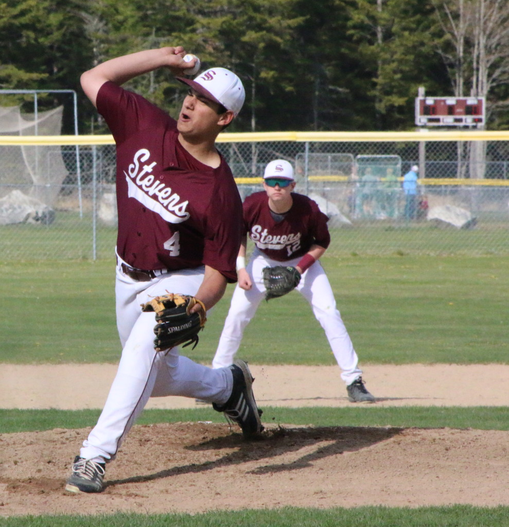 Stefan Simmons throws a fastball for strike three. Photo by Monique Labbe