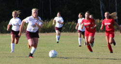 Nellie Haldane leads the charge up the field. Photo by Anne Berleant