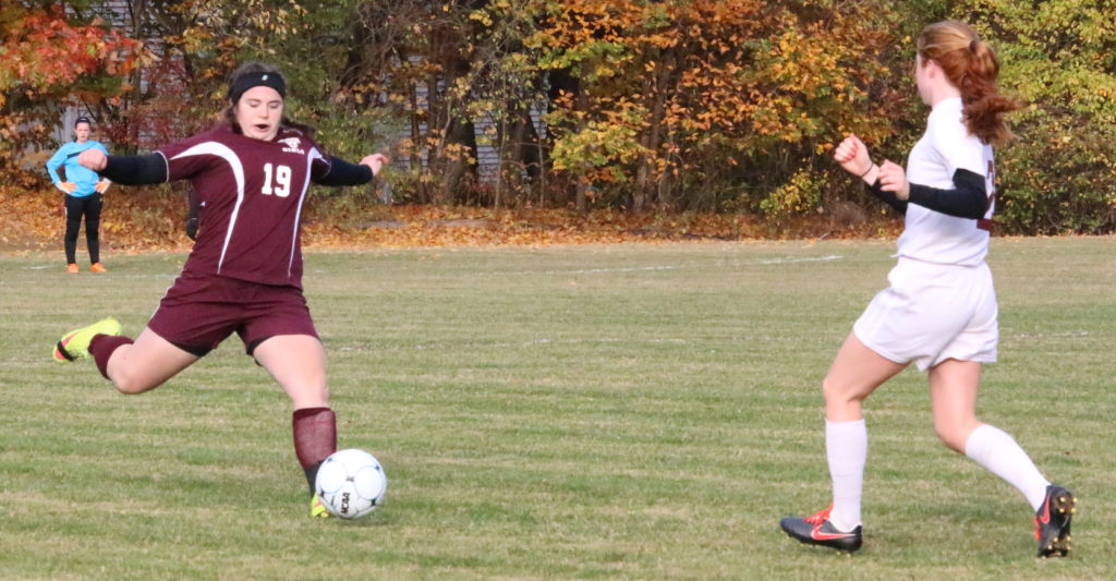 GSA defender Mallory Charette clears the ball out of the backfield. Photo by Monique Labbe