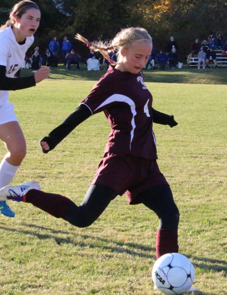 Hattie Slayton sends the ball up the right wing to the flag. Photo by Monique Labbe