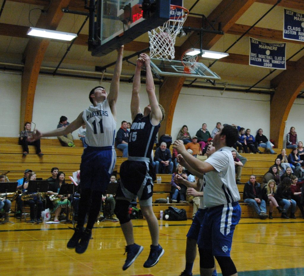 Ethan Bates Coles reaches for the layup against HIghview Christian. Photo by Jack Scott