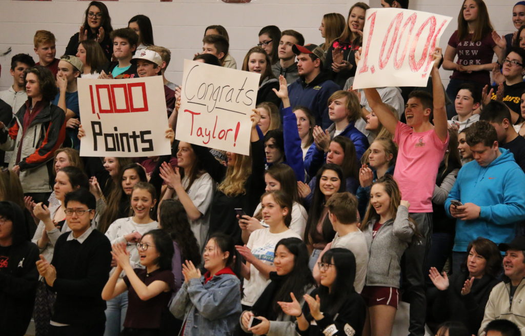 Fans react to Taylor Schildroths 1,000th point. Photo by Anne Berleant