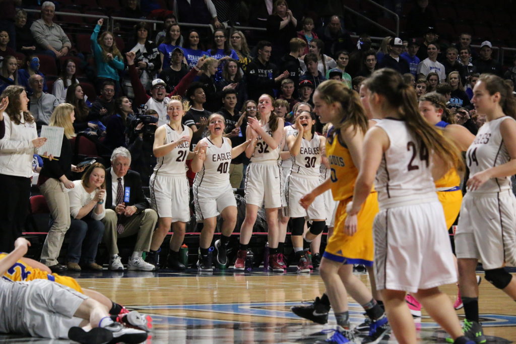 The Eagles start cheering as the last seconds tick down. Photo by Anne Berleant