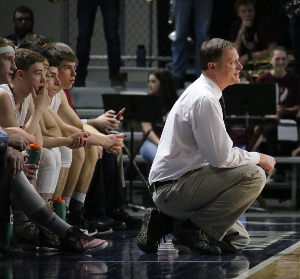 Coach Dwayne Carter reacts to a call. Photo by Anne Berleant