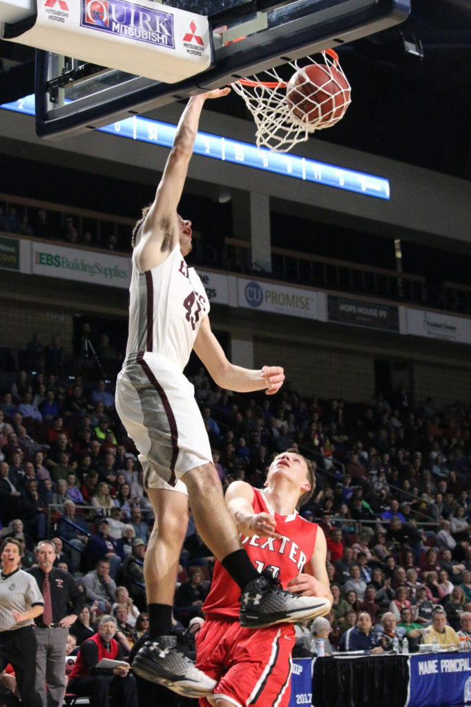 Jarrod Chase takes the dunk. Photo by Anne Berleant