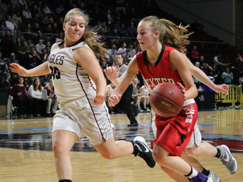 Emma Crosby works the Eagle defense in the final seconds of play. Photo by Anne Berleant
