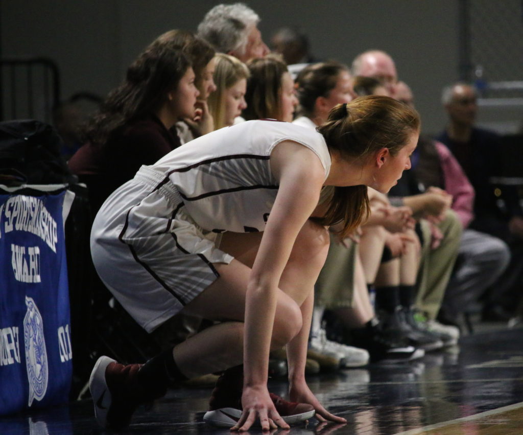 Mazie Smallidge waits to return to court. Photo by Anne Berleant