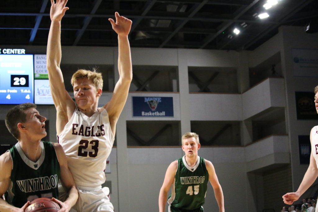 Max Mattson defends. Photo by Anne Berleant