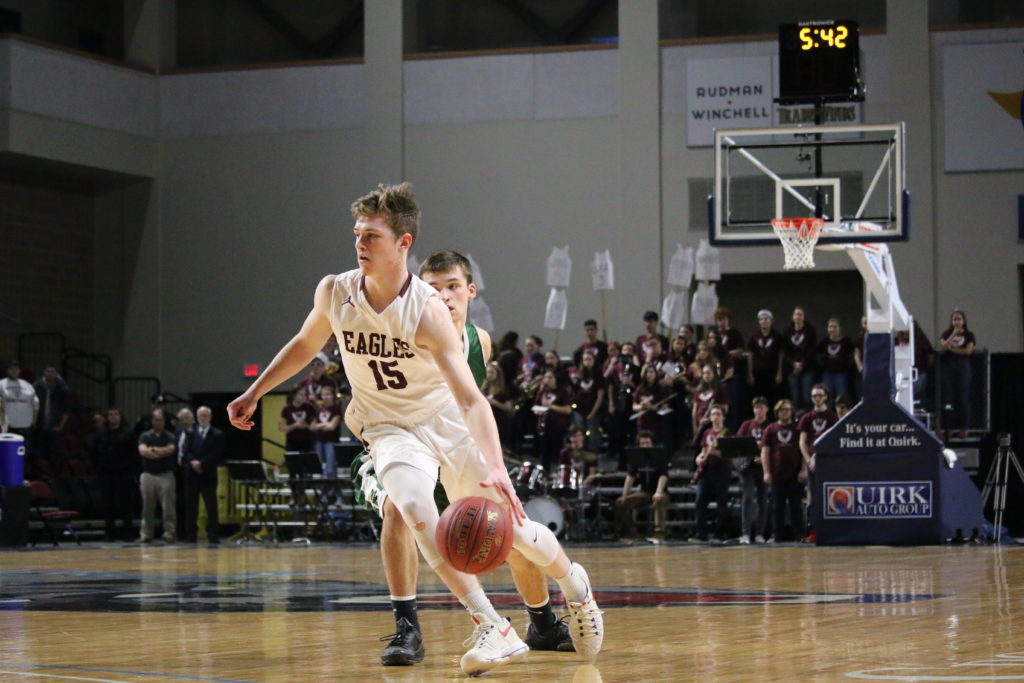 Taylor Schildroth drives down court. Photo by Anne Berleant