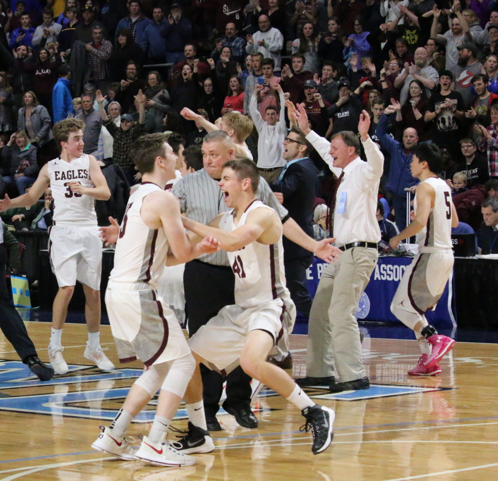 The Eagles and fans celebrate winning back-to-back state championships. Photo by Anne Berleant