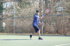Roddrigo Cespedes backhands a return