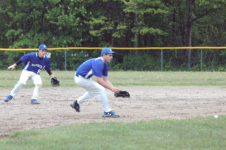 Nathan Winchester goes for the grounder against Jonesport. Photo by Jack Scott