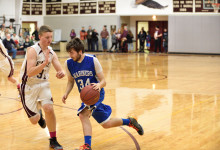 Mariner Matt Duddy works around the defense