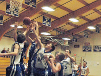 Mason Oliver and Paul Zoephal fight for the rebound