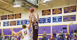 Senior Finn Davis-Batts goes for a lay-up