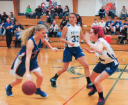 Mariner Savannah Lowery throws up a defense