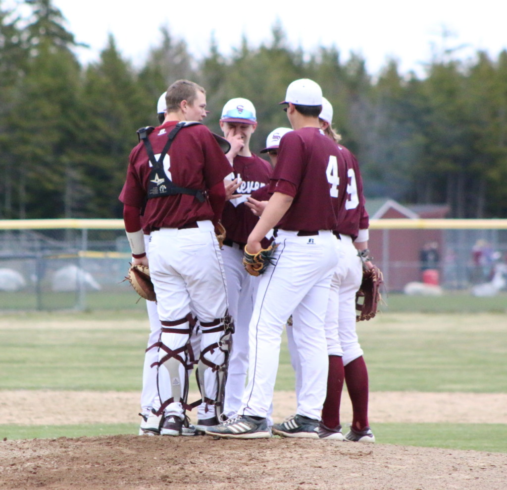 The infield meets at the pitcher's mound. Photo by Monique Labbe