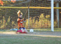 Mariner Jessalyn Gove makes a save. Photo by Jack Scot.