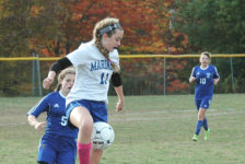 Mariner Lilly Gray maintains control. against Searsport. Photo by Jack Scott