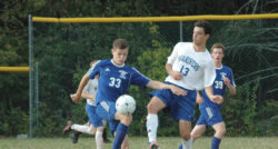Arthur Peixoto works for the ball against Searsport. Photo by jack Scott