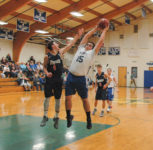 Ethan Shepard gets the rebound. Photo by Jack Scott