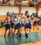 Madison Frazier grabs the rebound against Bucksport. Photo by Jack Scott