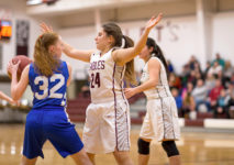 Kaley Eaton looks to drive past Tatiana Heggestad