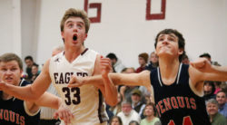 Percy Zentz boxes out the foul shot. Photo by Anne Berleant