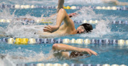Evan Soukup swims the 200 yard freestyle. Photo by Franklin Brown