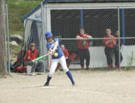 Katie Hutchinson tags a hit against Katahdin. Photo by Jack Scott