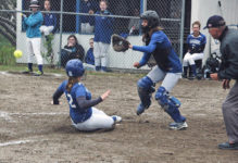 Brienna Limeburner slides home in a game against Jonesport. Photo by Jack Scott